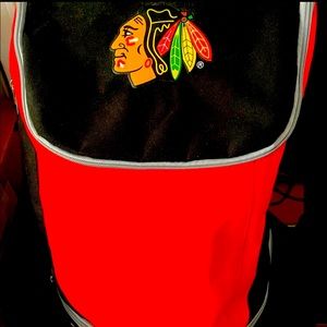 Large Chicago Blackhawks backpack with numerous pockets. Good overall condition